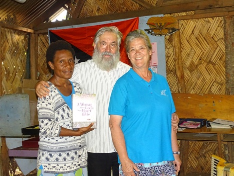 Sophie Isikel receiving Bible, March 2020